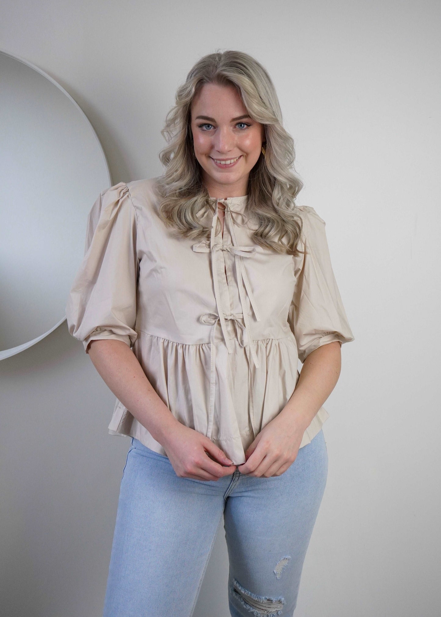 Peplum blouse met strikjes beige | Styles And More