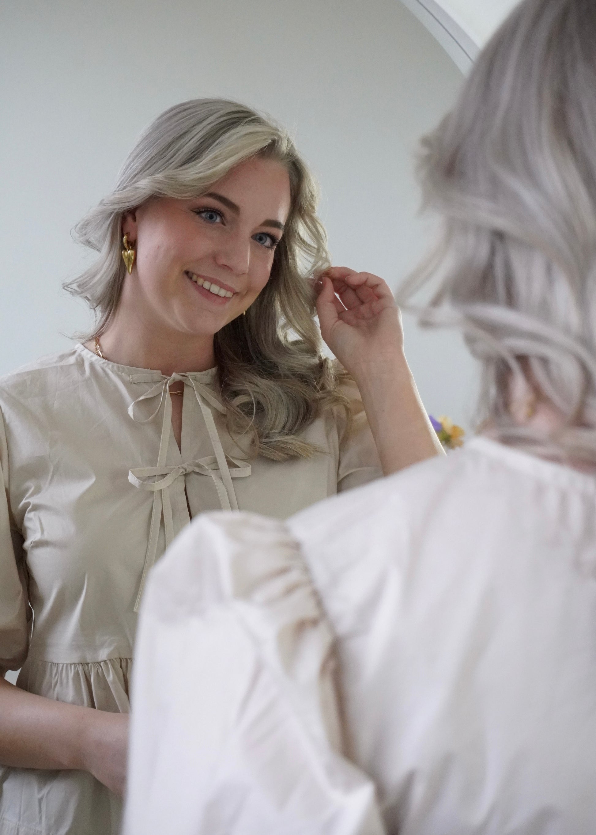 Peplum blouse met strikjes beige | Styles And More