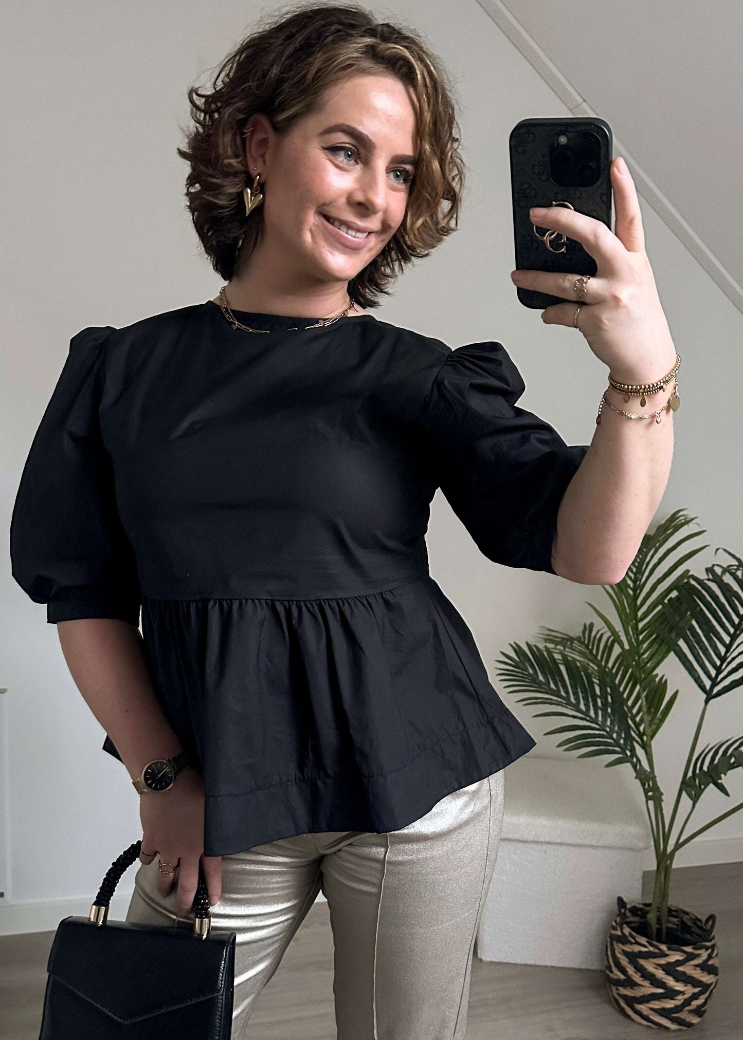 Peplum blouse met strikjes zwart | Styles And More